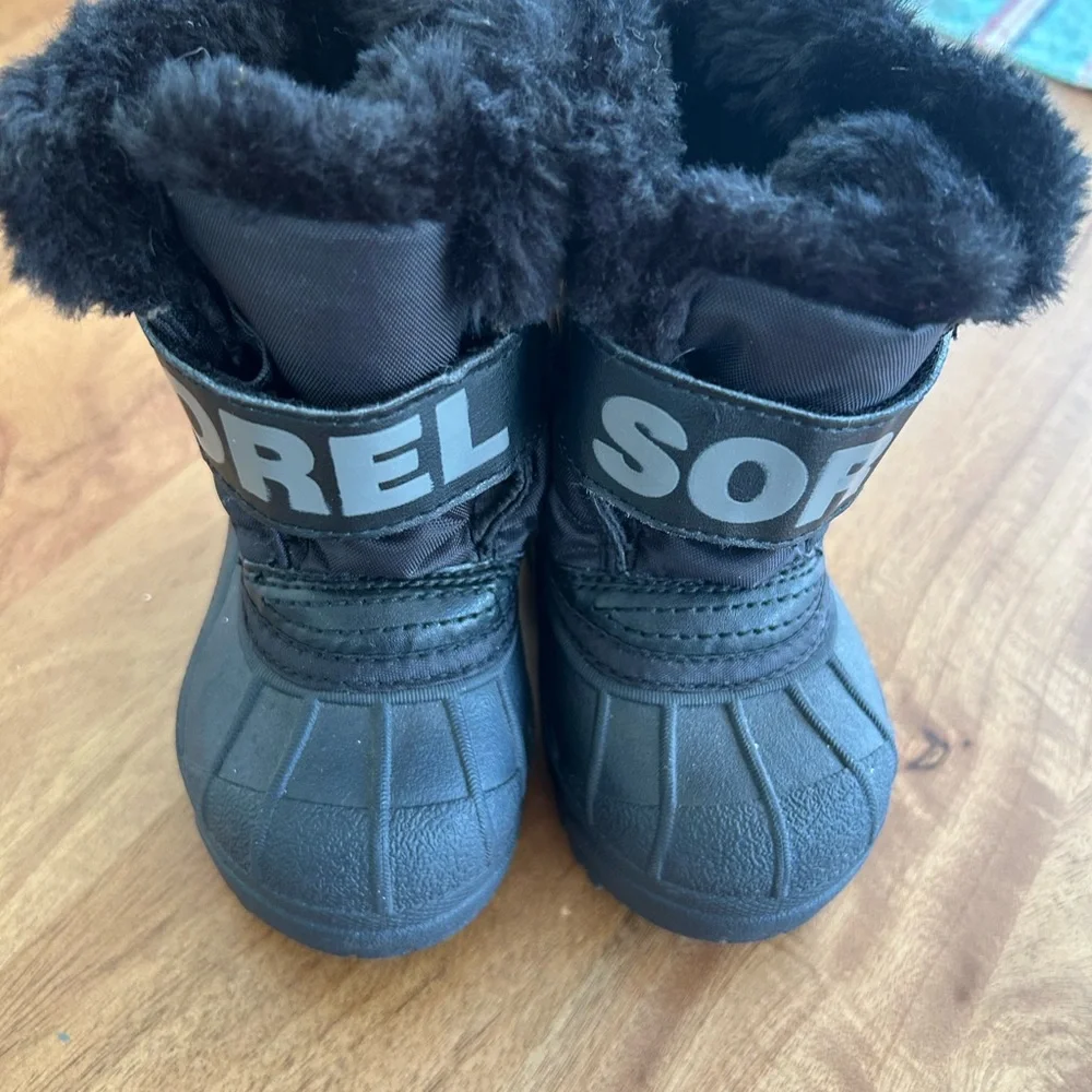 Sorel Kids Black Snow Boots with Velcro strap and Polar Bear Accent. Waterproof.